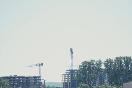 Lifting crane in the distanceの写真素材