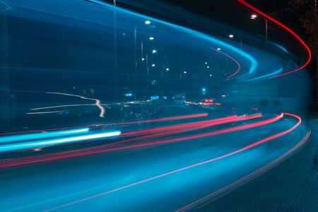 Traffic trail lights at night. Abstract urban backgroundの写真素材