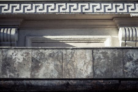 Front view of an ancient Greek architecture wall white background. Greece old fashion building...