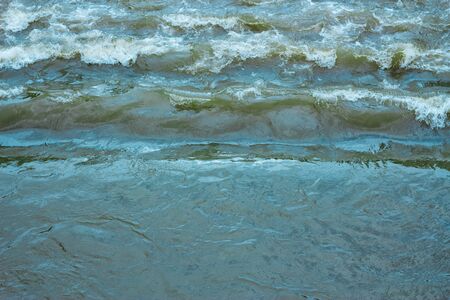 Background of a blue rough sea with white foam and waves that crush each other â€“ Natural...