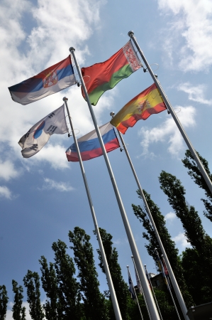 Five Flags of different nations with blue sky at the backgroundのeditorial素材