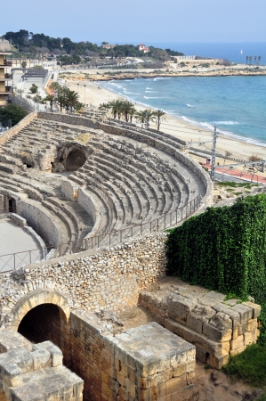Coastline of Tarragona, Spain with sea, ruins and skyの写真素材
