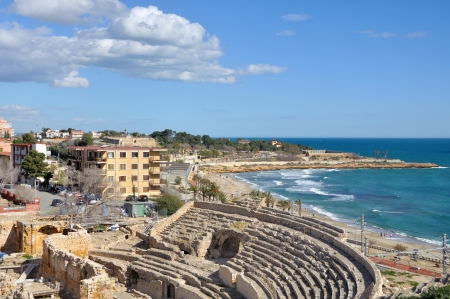 Coastline of Tarragona, Spain with sea, ruins and skyの写真素材