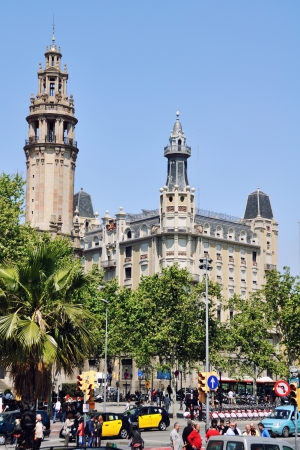 BARCELONA, SPAIN - APRIL 24: People walking by famous Passeig de Colom street in city center on April 24, 2013 in Barcelona, Spain. Midday in famous tourist city in spring.のeditorial素材
