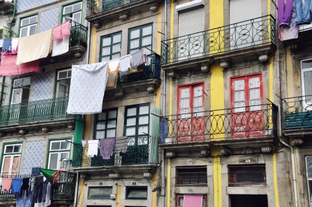 Colorful old houses of Porto, Portugal with hanging clothesの写真素材