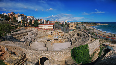 Coastline of Tarragona, Spain with sea and old roman theater ruins