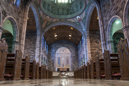 GALWAY, IRELAND - SEPTEMBER 11, 2014: Interior of a Roman Catholic Cathedral of Our Lady Assumed into Heaven and St Nicholas. Constructed in 20th century it is one of the largest buildings in the cityのeditorial素材
