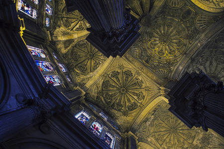 MALAGA, SPAIN - OCTOBER 12, 2014: Beautiful ceiling of the Cathedral - a Renaissance church in Andalusia. The interior has gothic and neoclassical art pieces.のeditorial素材