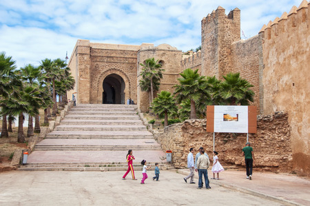 RABAT, MOROCCO - MAY 24, 2014: People with children in front of main gate to  Kasbah of the Udayas. It is a fortified palace and mosque added to the UNESCO World Heritageのeditorial素材