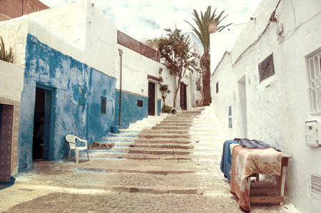 Famous blue and white streets of Kasbah of the Udayas in Rabat. Vintage look - faded colorsの写真素材