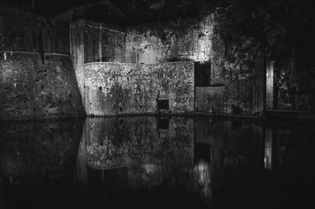 Entrance to the old medieval town Kotor, Adriatic Coast, Montenegro. Now it is a popular touristic destination with well preserved ancient castle St John. Black and whiteのeditorial素材