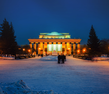 Illuminated Novosibirsk Opera and Ballet Theatre is popular place in Siberia, Russia. Its dome has a unique construction features. Beautiful design. Dark blue sky at nightのeditorial素材