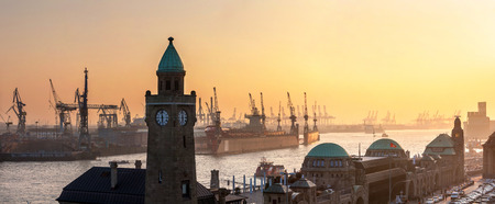Port of Hamburg on the river Elbe in Germany in the early morning. It is the third largest in Europe and the most popular attraction in the cityの写真素材