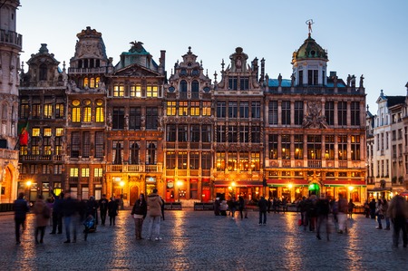Illuminated houses at the Grand Place square at night in Brussels, Belgiumの写真素材