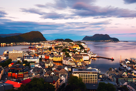 Aerial view of Alesund, Norway at sunrise. Colorful cloudy skyの写真素材