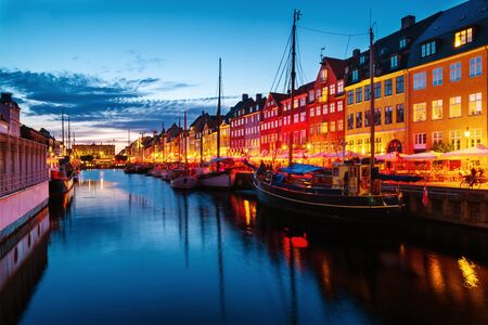 View of famous Nyhavn area in the center of Copenhagen, Denmark at nightの写真素材