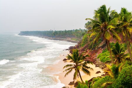 Kerala, India. Varkala beach with various cafes and restaurants at the cliff with Laccadive Sea and Varkala beach in Kerala, Indiaの写真素材