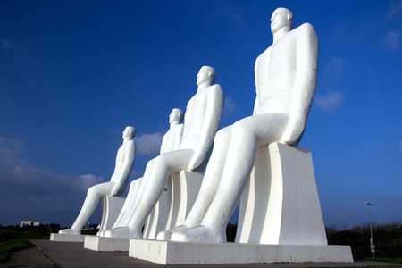 ESBJERG - NOVEMBER 9 2017: The Men at Sea is a monument of four 9 meter tall white males, located in Esbjerg, Denmark on the Beach. The sculpture was designed by Svend Wiig Hansen.のeditorial素材