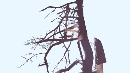 double exposure. tree and manの写真素材