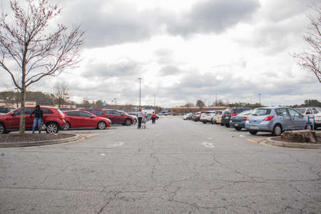 Snellville, Ga / USA - 03 13 20: View of people in the Walmart parking lotのeditorial素材