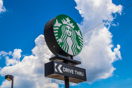 Conyers, Ga / USA - 07 27 20: View of the Starbucks Coffee street signのeditorial素材