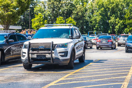 Gwinnett County, Ga / USA - 07 09 20: Rear view of a black and white Police Cruiser