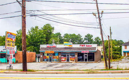 Decatur, Ga / USA - 07 07 20: View of a small urban shopping center on Glenwood roadのeditorial素材