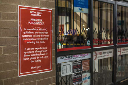North Augusta, SC USA - 11 21 20: Office Depot Office Max at night covid-19 sign
