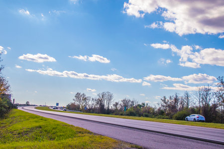 Augusta, Ga USA - 11 04 20: Traffic on a highway with clouds and blue skies side road viewのeditorial素材