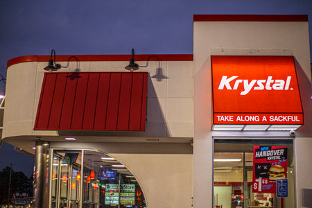 Augusta, Ga USA - 12 17 20: Krystal Burgers Fast Food Restaurant at night drive thru window left copy spaceのeditorial素材