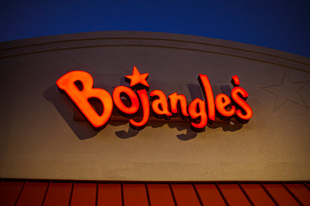 Columbia County, Ga USA - 12 22 20: Bojangles fast food restaurant at night orange building signのeditorial素材
