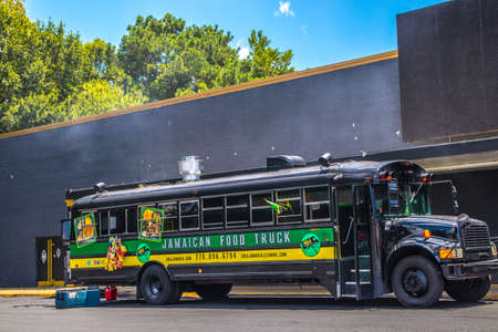 Decatur, Ga / USA - 07 23 20: View of an urban Jamaican Food Truck with a smoking grill close up