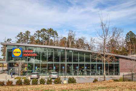 Augusta, Ga USA - 01 06 21: LIDL food market retail grocery store exterior view people inside wearing face masksのeditorial素材
