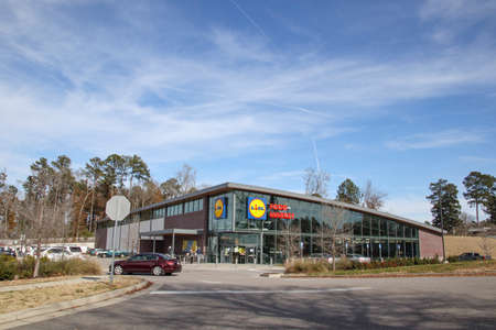Augusta, Ga USA - 01 06 21: LIDL food market retail grocery store car motion