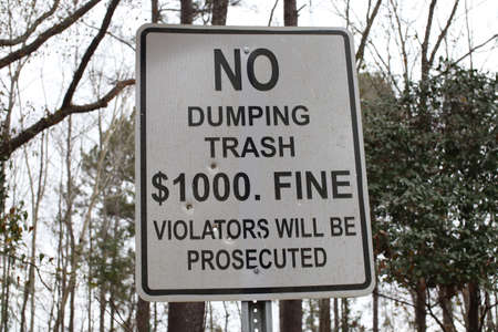 No Dumping Trash sign in rural Georgia in a wooded areaの写真素材