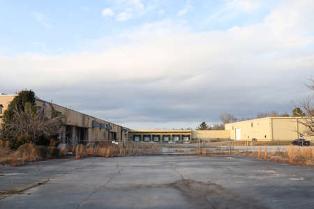 Wrens, Ga USA - 01 25 21: The GLIT plant now closed distant view fence and docks