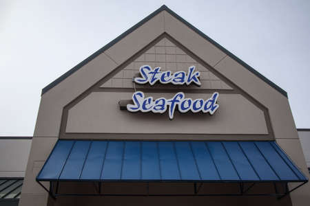 Augusta, Ga USA - 02 03 21: Steak and Seafood sign on a restaurant buildingのeditorial素材