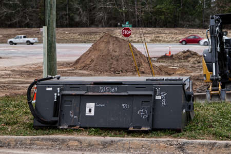 Augusta, Ga USA - 03 06 21:  A gray metal box with power cables and markings in white marker at a...