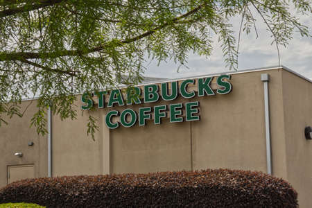 Augusta, Ga USA - 04 29 21: Starbucks coffee and fast food restaurant building sign - Washington Roadのeditorial素材