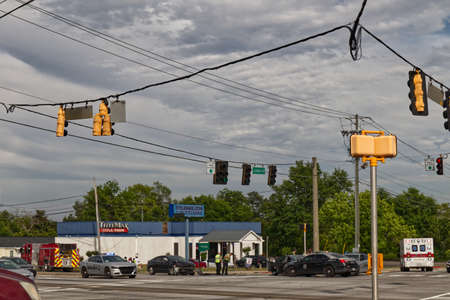 Augusta, Ga USA - 04 30 21: Police at the scene of an accident at a 4 way intersection - Hwy 25