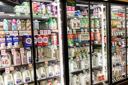 Augusta, Ga USA - 09 22 21: Sprouts retail grocery store milk case and pricesのeditorial素材