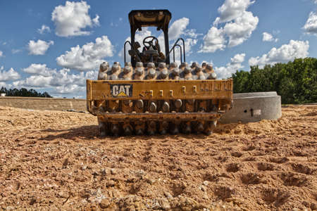 Augusta, Ga USA - 09 10 21: Construction site CAT land roller CP56B front viewのeditorial素材