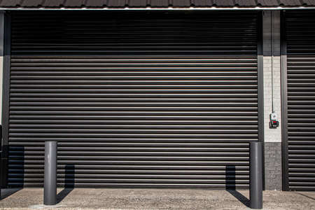 A roll down steel security door to protect a store in and urban area