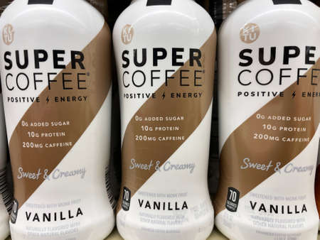 Evans, Ga USA - 12 20 21: Cold coffee energy drinks on a retail grocery store shelfのeditorial素材