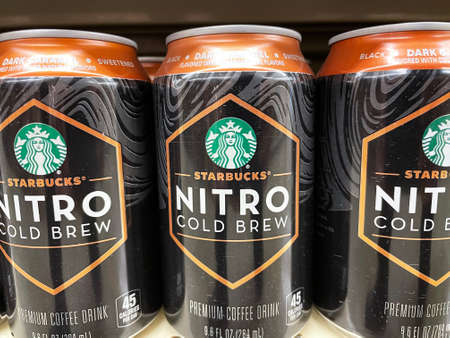 Evans, Ga USA - 12 20 21: Cold coffee energy drinks on a retail grocery store shelf