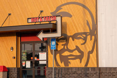 Wrens, Ga USA - 07 25 21: KFC fast food fried chicken restaurant side entrance exterior