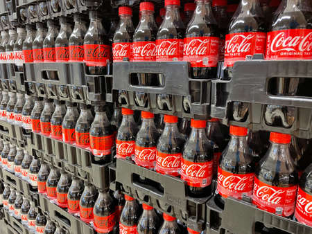 Grovetown, Ga USA - 05 10 22: Retail store Coca Cola in black trays stacked neat side viewのeditorial素材