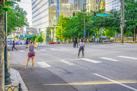 Atlanta, Ga USA - 05 30 20: People taking pictures of the police barricade and the protestersのeditorial素材
