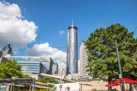 Atlanta, Ga USA - 05 30 20: Westin tower and a man wearing a face maskのeditorial素材