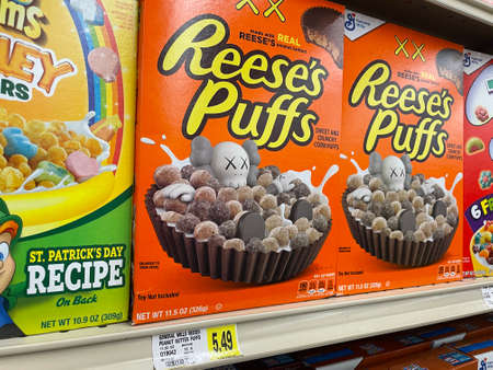 Hephzibah, Ga USA - 06 06 22: IGA KJs Retail store Cereal Reeses Puffs and price